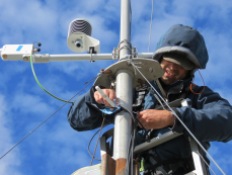 Checking the equipment at top of mast